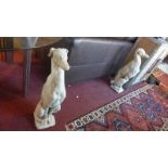 Two reconstituted stone greyhounds, seated on square bases, H.75cm (2)