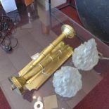 A pair of brass wall lights in the form of flaming torches with opaque glass shades H70cm