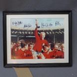 A signed printed photograph of England players at the World Cup 1966, with Bobby Moore holding the