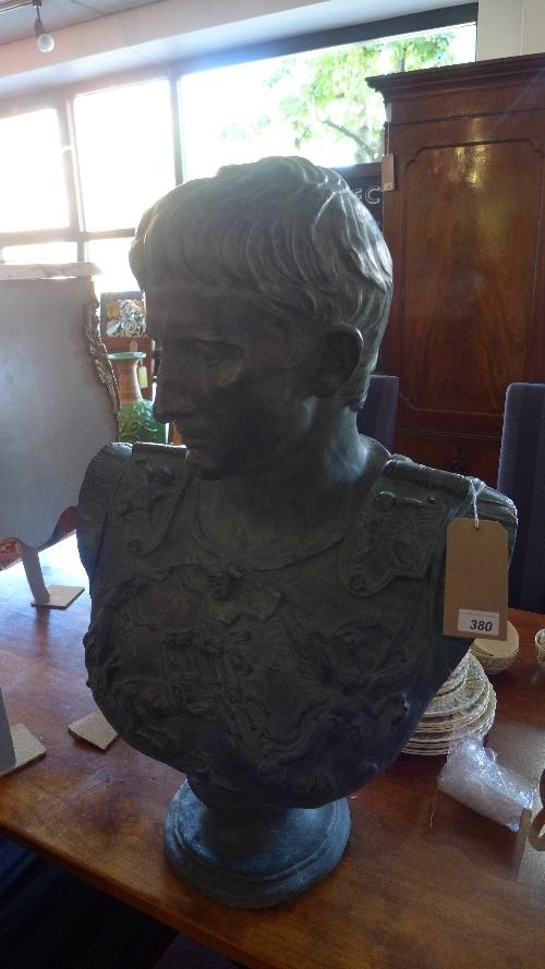 A cast plaster head and shoulder bust of Augustus wearing armour, on socle base, H.83cm