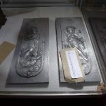 A pair of relief carved plaques, depicting Alphonse Mucha style maidens and cherubs having