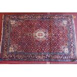 An extremely fine North West Persian Bidjar rug with a central double pendant medallion with