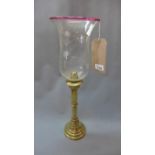 An early 20th century Russian brass storm lantern, with acid etched glass shade, makers stamp to