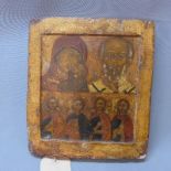 A Russian icon in two registers, depicting the Mother of God and St Nicholas of Myra above four
