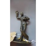 A 20th century Continental bronze of a clown, on oval base, H.13cm