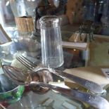 A continental silver spoon and fork together with a silver topped sugar sifter
