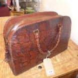 A vintage python skin handbag