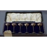 A cased set of six silver goblets, hallmarked Birmingham 1919, maker 'I.M.H'