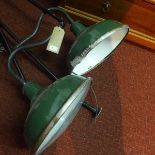 A pair of green industrial lights with wall attachments (a/f)