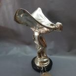 A chromed metal 'Spirit of Ecstasy' mascot, raised on circular marble base, H.35cm