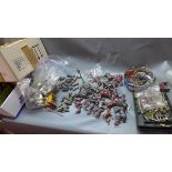 A large collection of hollow cast lead farm animals, figures and accessories, comprising farmyard