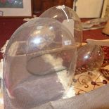 Three glass domes of varying sizes, with no bases, (3)