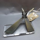 After Alberto Giacometti, a bronze figural study, 'At the X-Roads of Life', on rectangular perspex