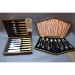 A Edwardian set of twelve plated teaspoons and a pair of sugar tongs, in fitted box, together with a