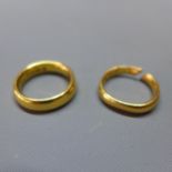 A 22ct yellow gold wedding band, hallmarked London, and a a 22ct yellow gold wedding band,