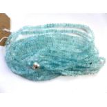 A contemporary Ladies nine multi-strand beaded Aquamarine necklace having 925 sterling silver hook