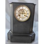 A late 19th century black slate mantel clock, the 5" enamel Roman dial with visible Brocot