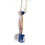 A Ladies 9ct yellow gold Edwardian two drop pendant necklace having blue stones on a gold chain (