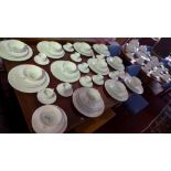 A Limoges porcelain dinner service, Imperatrice pattern, comprising of 12 large plates, 12 coffee