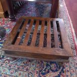 An early 20th century iron bound teak luggage rack, H.19 W.55 D.55cm