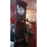 An early 20th century oak longcase clock, the dial signed O.Dusonchet, Cairo, H.220cm