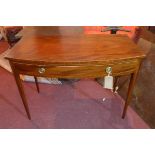 A Regency bow front mahogany side table, with single drawer, raised on tapered legs, H.74 W.102 D.