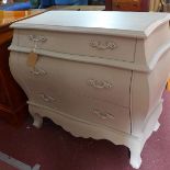 A 20th century grey painted bombe chest, with three drawers, raised on cabriole legs, H.89 W.94 D.