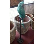 A contemporary fibre glass parrot, on stand, H.120cm