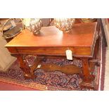A Victorian mahogany console table, with single drawer, raised on carved supports, joined by