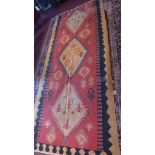 A fine South West Persian Qashqai kilim, triple pole medallion with repeating petal motifs on a