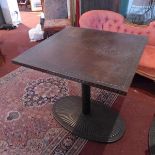An Art Deco style cast iron garden table, with copper clad top