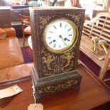 A French ‘tole’ mantel clock, c.1860, eight day movement, the sheet metal case with painted floral