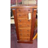 A William IV mahogany Wellington chest, with seven graduating drawers, raised on stepped base, H.105