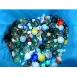 A collection of vintage marbles