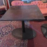 An Art Deco style cast iron garden table, with copper clad top