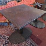 An Art Deco style cast iron garden table, with copper clad top