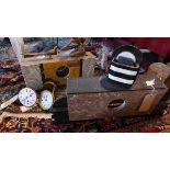 An Art Deco marble mantel clock case with gilt metal finial in form of a lady kneeling to feed a