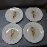 A set of six early 20th century Persian porcelain plates, decorated with a young lady carrying a