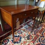 A 19th century mahogany low boy, with three drawers, raised on tapered legs and spade feet, H.58 W.