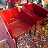 A pair of red Mixx chairs designed by Matthias Demacker