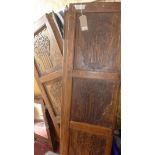 A pair of 17th / 18th century Islamic teak doors, carved with Arabic script, 183 x 55cm