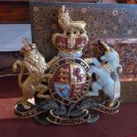 A painted plaster armorial crest