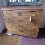 An early to mid 20th century teak chest, with four drawers, raised on plinth base, H.87 W.90 D.54cm