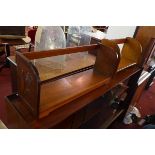 An art deco oak book trough, together with one other oak example