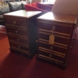 A pair of Regency style mahogany side chests, with four drawers, raised on bracket feet, H.71 W.45