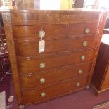 A Regency mahogany bow front chest, with two over four long graduating drawers, having rosewood
