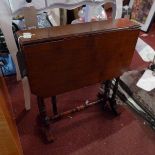 An early 20th century mahogany Sutherland table