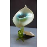 A Vaseline glass vase, in the shape of a lily, H.23cm