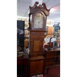 A late 19th century walnut, oak and mahogany long case clock, with floral hand painted wooden