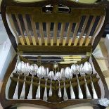 A complete canteen of plated cutlery for six by D. George Collins Ltd, in serpentine fronted oak